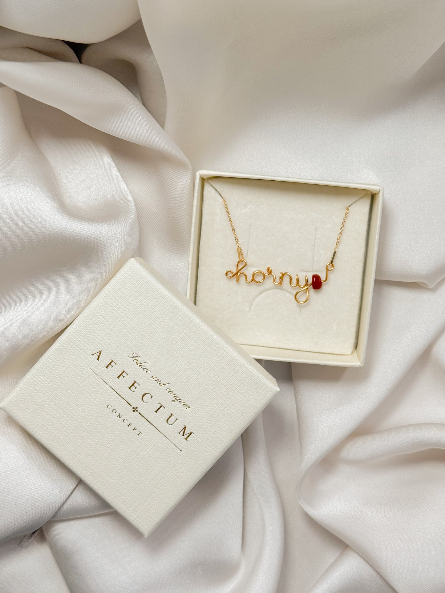 Colier handmade cu mesajul "Horny" si jasp rosu, piatra focului