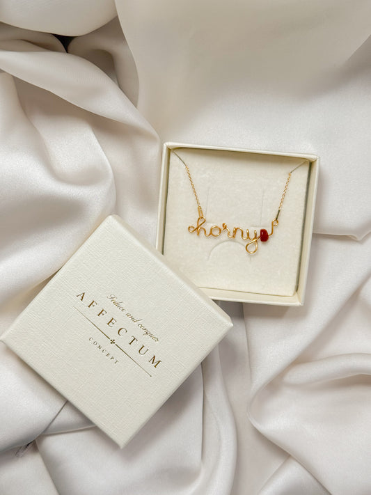 Colier handmade cu mesajul "Horny" si jasp rosu, piatra focului